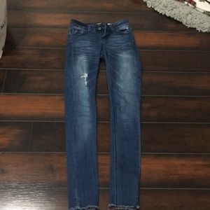 Ripped blue jeans